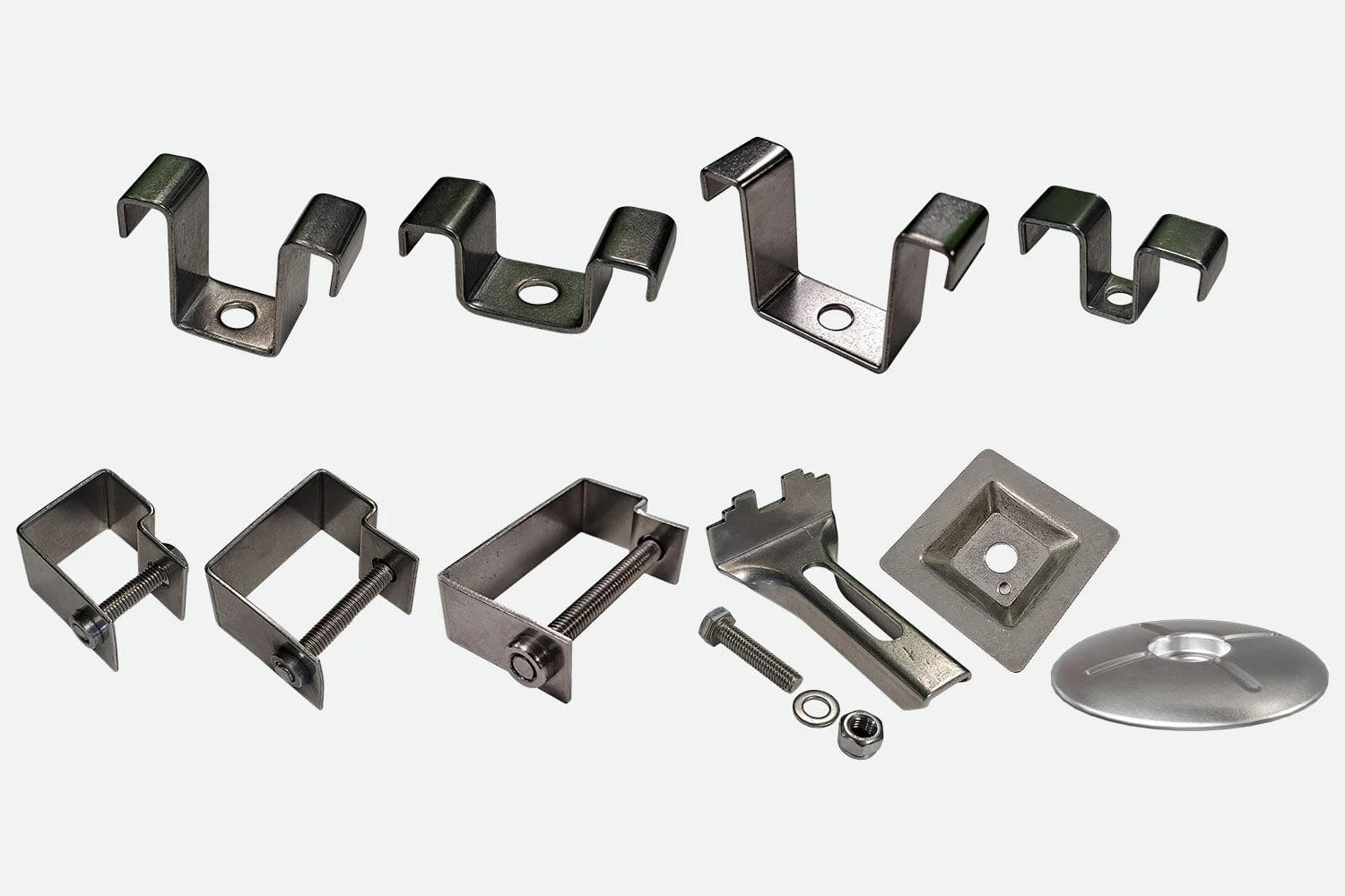 A set of stainless steel floor grating clips and clamps with their bolts